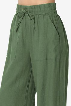 Essential pants for kicked-back days in the sun are cut from cool, crisp linen with a drawstring waist to make them extra comfortable and easy to fit. Wear yours with a tucked-in blouse and sandals.Lightweight woven linen blend, High riseElasticized drawstring waist, Slant front pockets, Faux welt back pockets with buttonRelaxed fit, Wide leg, Pull-on style, 28in inseamFits true to US size, take your normal size(S=2-4)Model size : 5'3" height, 34" bust, 24" waist, 34" hip, and is wearing a size Solid Color Vacation Harem Pants With Pockets, Green Bottoms With Tie Waist For Loungewear, Green Loungewear Bottoms With Tie Waist, Casual Ankle-length Wide Leg Pants With Tie Waist, Beach Pants With Drawstring, Ankle-length Wide Leg Pants With Drawstring For Vacation, Solid Wide Leg Beach Pants With Drawstring, Casual Solid Color Harem Pants For Vacation, Green Wide Leg Pants With Pockets For Vacation