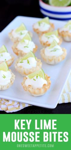 key lime mousse bites on a white plate next to a bowl of limes