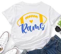 a t - shirt with the word devil's on it and a football ball