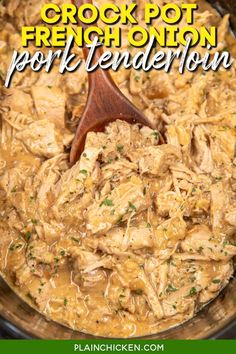 crock pot french onion pork tenderion in a slow cooker with a wooden spoon