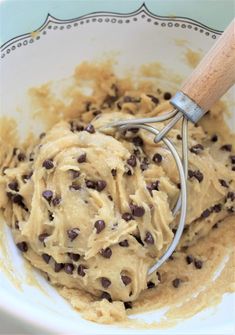 a bowl filled with batter and chocolate chips