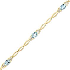 Dress her wrist in elegant beauty. Graceful in 10K gold, delicate open links connect the sparkling aquamarines featured in this stunning fashion bracelet. Feminine and oh-so-precious butterflies adorn both sides of each brilliantly shimmering 6.0 x 4.0mm oval aquamarine. A lovely surprise for the March-born birthday girl, this 7.0-inch bracelet secures with a lobster claw clasp. March Stone, Elegant Beauty, Wedding Fun, Local Jewelry, Aquamarine Stone, Aqua Marine, Gemstone Bracelets, Birthday Girl, Gemstone Bracelet