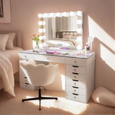 a bedroom with a vanity, mirror and chair