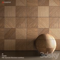 a wooden vase sitting on the floor next to a wall with geometric patterns in it