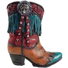 a pair of cowboy boots with fringes and beads