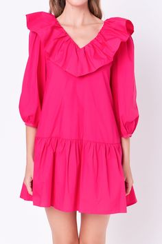 This sweet and chic ruffled mini is perfect for dressing up or dressing down. With a flattering v-neckline and delicate ruffle detail, this mini is perfect for showing off your curves. Made with a soft and lightweight fabric, it's perfect for layering. Dress it up with heels or dress it down with sandals - either way, you're sure to fall in love with our ruffled mini. V neckline Ruffle detail 3/4 puff sleeve Mini length Lining Hand wash cold Do not bleach Do not tumble dry Iron low Shell: 100% Cotton Lining: 80% Polyester 20% Cotton HN1196D Total length :33.75" Bust :36.5" S Height 5'9"/(175cm) / Bust 30"/(76.5cm) / Waist 24.5"(62cm) / Hip 34"(86cm) Pink V-neck Mini Dress With Ruffle Hem, Chic Pink V-neck Ruffle Dress, Spring Tiered V-neck Dress With Ruffles, Feminine V-neck Ruffle Dress With Ruffle Hem, Chic V-neck Dress With Ruffle Hem For Day Out, Pink Chic V-neck Ruffle Dress, Spring V-neck Dress With Ruffle Sleeves, Flirty Ruffle Sleeve Mini Dress, Flirty Mini Dress With Ruffle Sleeves