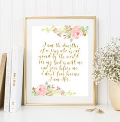 a framed print with the quote i am the daughter of a king