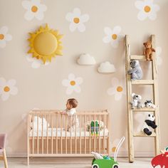 a child's room with flowers on the wall and toys in the crib