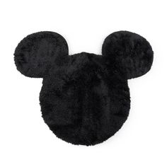 a black mickey mouse rug on a white background