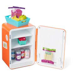 an orange and white mini refrigerator with food in it's door, next to a blue container filled with fruit