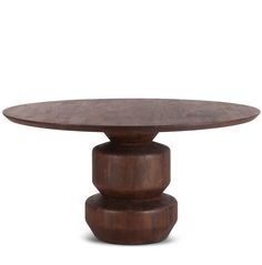 a round wooden table with three pedestals on the top and one in the middle