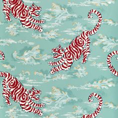 a blue background with red and white tiger designs