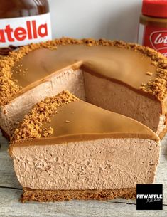 a chocolate cheesecake with peanut butter on top