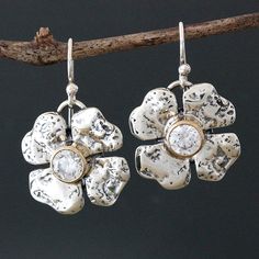 These lovely earrings feature a clover flower with a 14k gold bezel that holds a high quality cubic zirconia. These earrings truly sparkle! Approximately .75"Diameter. Sterling Silver, 14k Yellow Gold & Cubic Zirconia. Clover Flower, Tiny Earrings, Sparkle Earrings, Cubic Zirconia Earrings, Cz Earrings, Zirconia Earrings, Lovely Earrings, Small Earrings, Rose Earrings