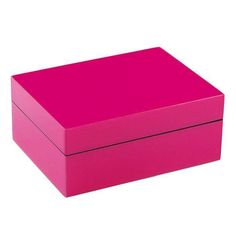 a bright pink box is sitting on a white surface and it's lid opened