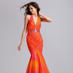 Colorful And Fun, This Ombre Prom Dress Will Have All Eyes On You On Prom Night! Featured In Fuschia/Orange, This Halter Top Dress Has A Ruched Bodice That Leads Into A Mermaid Skirt! An Embellished Sash Completes This Look, Having You Sparkling On Your Prom Night! Never Been Worn. Bought For A Spring Formal And Used A Different Gown. Ombre Prom Dress, Emerald Prom Dress, Long Blue Maxi Dress, Halter Prom Dress, Beaded Chiffon Dress, Lace Up Back Dress, Navy Prom Dresses, 2 Piece Prom Dress, Printed Prom Dresses