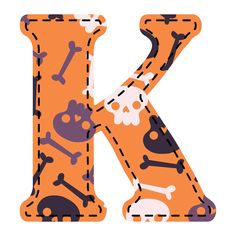 the letter k is decorated with skulls and bones on it's orange background,