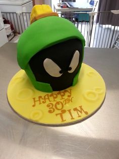 a cake that is shaped like an angry bird with the words happy new year on it