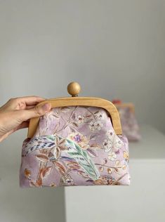 Shoulder Wooden Frame Handbag - Gifts idea for her, Bag for Mother, Bag for sister, Christmas gift idea, Clutch handbag, little handbag A stunning handbag adorned with delicate watercolor flowers, light and airy. It's like carrying a whole summer of blooms with you. Material - fabric. Wooden lock Size - 9x6.7x3.14inch (23x17x8cm) The strap is pink and made from a leather substitute. The length is adjustable, with a maximum length of 45inch (115cm) Let me know if any questions or you need more photos. Rectangular Pouch With Detachable Strap For Gift, Portable Clutch Bags For Gifts, Portable Clutch Bags As A Gift, Handmade Handheld Pouch, Feminine Rectangular Bag With Zipper Pouch, Top Handle Pouch With Removable Pouch As Gift, Rectangular Coin Purse With Detachable Handle, Handheld Bags As Gifts, Handheld Shoulder Bag With Removable Pouch As Gift