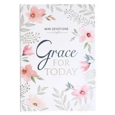 a white book with pink flowers and leaves on the cover that says grace for today