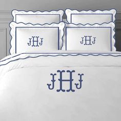 the monogrammed bedding is white and blue