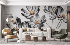 a living room with flowers painted on the wall