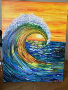 an acrylic painting of a large wave in the ocean at sunset or sunrise