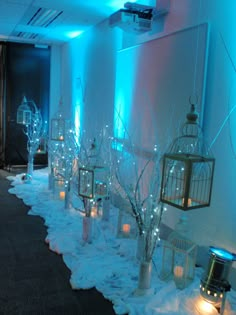 an image of a room decorated with candles and snow