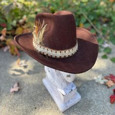 ~ALL SALES ARE FINAL  ITEM DETAILS *Vintage  *Western  100% Wool *Unisex *Hat Band with Feathers  ITEM SPECIFICS LABEL: ?   TAG SIZE: 7 1/8 COLOR: Brown CONDITION: Gently worn vintage condition  *Check out my Etsy store for more great finds!* Instagram | LorettasLaundryVintage Vintage Rodeo Cap, Vintage Hat For Western-themed Events, Vintage Handmade Hats For Country Events, Vintage Hat Bands For Fall Festival, Vintage Wide Brim Hat For Fall, Southwestern Hats For Western-themed Fall Events, Southwestern Style Hats For Western-themed Fall Events, Southern Style Hat With Short Brim For Western-themed Events, Southwestern Style Hat For Western-themed Fall Events