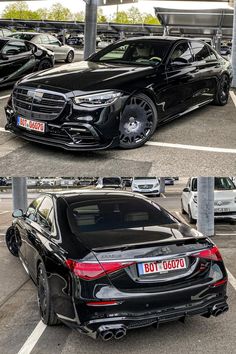 two cars parked next to each other in a parking lot, one black and the other white