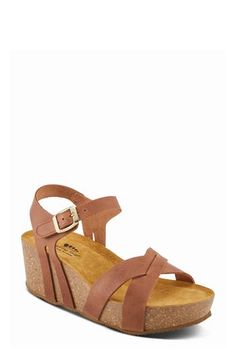 A cork-wrapped platform and chunky wedge heel elevate a weekend-ready leather sandal fitted with an adjustable strap at the ankle. 1 3/4" heel; 1 1/4" platform Adjustable ankle strap with hook-and-loop closure Molded footbed Leather upper and lining/synthetic sole Made in Spain Open Toe Cork Wedge Sandals With Heel Strap, Cork Wedge Sandals With Heel Strap And Round Toe, Cork Wedge Sandals With Heel Strap, Cork Sandals With Heel Strap And Wedge Heel, Cork Wedge Sandals With Removable Insole And Ankle Strap, Cork Wedge Sandals With Buckle Closure, Cushioned Cork Wedge Sandals With Round Toe, Adjustable Round Toe Wedge Sandals With Cork-bed Midsoles, Platform Sandals With Cork And Round Toe