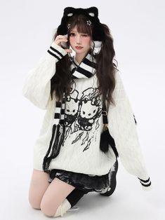 Wrap yourself in the ultimate blend of comfort and cuteness with our White and Black Electronic Kitty Sweet Cozy Sweater. This delightful sweater features an adorable electronic kitty design that adds a playful touch to your wardrobe. The round neckline and relaxed fit provide maximum comfort. As a special bonus, each sweater comes with a free matching scarf, enhancing your style while offering additional warmth.  Garment Size   	 		 			Size 			S 			M 			L 		 		 			Full Length 			68 			70 			72 Kawaii White Sweater For Winter, Black Techwear, Knitted Leg Warmers, Free Scarf, Ruffle Mini Skirt, Casual Wide Leg Pants, Crazy Girls, Cozy Sweater, Cargo Jeans