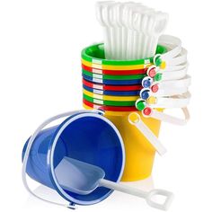 a stack of plastic cups with forks and spoons next to each other on a white background