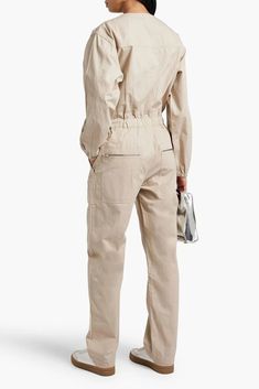 Model is 177cm/ 5'10' and is wearing a FR 36.Jumpsuit.Cotton-canvas.Eyelets.Elasticated waist.Elasticated cuffs.Multipockets.Zip fastening along front.Non-stretchy fabric.Mid-weight fabric.Machine wash or dry clean.Imported.Size & Fit:.Designed to be slightly fitted at the bust and waist with straight leg trousers.Fits true to size, take your normal size Utility Style Workwear Jumpsuits With Cargo Pockets, Utility Jumpsuits With Cargo Pockets For Work, Cotton Jumpsuits With Cargo Pockets For Fall, Utility Jumpsuits And Rompers With Cargo Pockets For Work, Cotton Jumpsuits And Rompers With Cargo Pockets For Fall, Fall Cotton Jumpsuits With Cargo Pockets, Fall Cotton Jumpsuits And Rompers With Cargo Pockets, Utility Cotton Jumpsuits With Cargo Pockets, Utility Cotton Jumpsuits And Rompers With Cargo Pockets