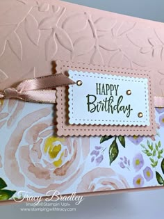 a close up of a birthday card with flowers