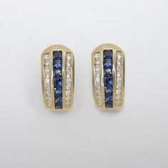 Why we love it:These vintage huggie earrings boast rich color and vibrant sparkle. The rich blue sapphires pair perfectly with the yellow gold, and the diamonds stand out brilliantly.Highlights:- Estate piece- 1.50ct of rich blue natural sapphires- 0.60ct bright white and eye clean G-H VS1-SI1 diamonds- Buttery 14k yellow goldDimensions:18.7 x 9.4mm Luxury Channel Set Diamond Huggie Earrings, Yellow Gold Round Huggie Earrings Channel Set, Yellow Gold Channel Set Huggie Earrings, Luxury Sapphire Yellow Gold Earrings, Luxury 14k Gold Diamond-cut Huggie Earrings, Sapphire Side Stones, Diamond Huggie Earrings, Huggie Earrings, Marquise Diamond