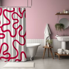 a bathroom with pink walls, white fixtures and a red shower curtain in the corner