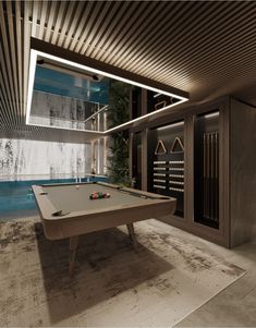 a pool table in the middle of a room