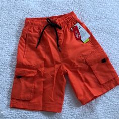 Orange With Black Tie Waist And Two Side Velcro Pockets. Inner Lining . Please See Photo For All Size Specs! Sports Gear, Kids Sports, Spf 50, Kids Bottoms, Black Tie, Color Orange, Kids Shop, Orange, Sports