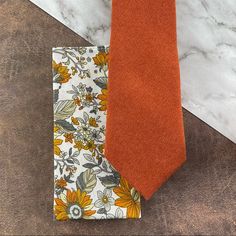 This Dapper Tie And Handkerchief Combination Is Perfect For The Groomsmen To Coordinate In Your Wedding. It’s Also A Great Style For Parties And Proms! Includes: (1) Necktie / Slim Width, Approx. (W) 2.75” X (L) 58, Cotton-Polyester Blend (Velour Micro-Twill With A Soft, Suede Texture), Dry Clean Only (1) Floral Print Pocket Square / 100% Cotton Fabric, Approx. 12” X 12”, Dry Clean Only Thank You! Grooms Suits, Blue Gray Gold, White Sunflower, White Sunflowers, Necktie Set, God Father, Orange Tie