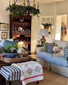 a living room filled with furniture and decor