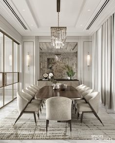 an elegant dining room with chandelier, chairs and a large wooden table in the center