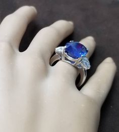 GORGEOUS 14K WHITE GOLD engagement ring natural blue sapphire in cushion shape GIA cert center weight 10.83carat . size 11.4x13.4mm very nice royal blue color , nice luster, very lively ,nice cut. clean.sparkly sapphire . side two natural diamonds total weight 1.65ct. Size 5.7mm G-SI2 ring size 6.5 Resizable GIA certificate Appraisal available Retail value $22,500 net. Elegant Blue Sapphire Ring With Large Stone, Elegant Large Blue Sapphire Ring, Cushion Cut Lab-created Sapphire Wedding Ring, Cushion Cut Lab-created Sapphire Diamond Ring, Cushion Cut Lab-created Sapphire Ring, Blue Cushion Cut Lab-created Sapphire Rings, Lab-created Cushion Cut Sapphire Jewelry, Platinum Engagement Rings Vintage, Champagne Diamonds Engagement