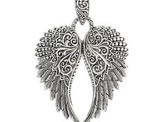 an angel wing pendant on a white background