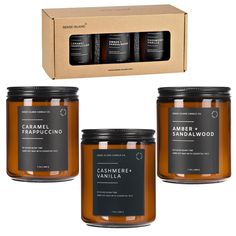 three jars of caramel and sandalwood candles in front of a cardboard box