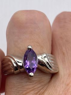 Unusual amethyst  ring Sterling setting handmade  Size 8 can be re sized for you.  My jeweler charges $20 Sterling Silver is rhodium finished to prevent tarnish All rings are shipped in a nice gift box.   Check out our over a THOUSAND great reviews Engraving is $4 per letter and is not always perfect depending on the piece. It can take a few days if the jeweler is busy. This is payable to Paypal Judithsltd@gmail.com Fine Jewelry Amethyst Ring With Vs Clarity, Silver Solitaire Ring Gemstone, Purple Amethyst Promise Ring In Marquise Shape, Purple Marquise Amethyst Promise Ring, Sterling Silver Marquise Birthstone Jewelry, Sterling Silver Solitaire Gemstones For Anniversary, Sterling Silver Solitaire Jewelry, Marquise Cut, Purple Marquise Cut Promise Ring, Sterling Silver Hallmarked Amethyst Promise Ring