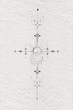 the cross is drawn in black ink on white paper with an intricate design and decorative elements