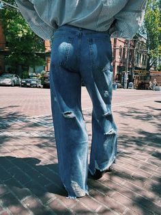 Our Free Ride jeans are the perfect pair of trendy and distressed wide fit jeans. With comfort stretch denim, putting these on will feel like a dream. Material: 80% Cotton 20% Polyester Size Guide: Size / Waist / Inseam / Ankle Width S : 28" / 29.5" / 10" M : 30" / 29.5" / 11.5" L : 32" / 29.5" / 12" Trendy Ripped Mid-rise Flare Jeans, Trendy Distressed Flare Jeans, Trendy High Rise Distressed Flare Jeans, Trendy Distressed High-rise Flare Jeans, High Waist Ripped Cotton Flare Jeans, Trendy Mid-rise Ripped Flare Jeans, Trendy Distressed Denim Flare Jeans, Chic Ripped Dark Wash Flare Jeans, Chic Dark Wash Ripped Flare Jeans