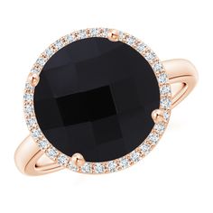 This scintillating cocktail ring showcases a checkerboard-cut, prong set round black onyx. Luminous round diamonds surround it and create a striking halo. Crafted from 14k rose gold, this ring also features a reverse tapered shank. Black Onyx Ring, Onyx Ring, American Diamond, Rings For Her, Diamond Halo, Anniversary Ring, Cocktail Ring, Black Rings, Diamond Gemstone