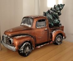 "This gorgeous one of a kind accent piece will be the perfect addition to your Christmas display!  This is a hand-painted 7\"x5\" Ceramic Bisque Vintage Style Truck with Tree with a copper metallic finish, snow texture, and sealed with triple thick gloss. -Comes with 1 pack (50 count) of multi-color pin lights and a clip-in light kit Hand-painted with love by Chicago artist, Liz Brent www.lizbrentart.com  Buyer is not purchasing the rights to the image. Even after the sale of original work, any Ceramic Truck With Christmas Tree, Ceramic Truck, Pin Lights, Vintage Truck Christmas, Snow Texture, Truck Paint, Chicago Artists, Pottery Inspiration, Ceramic Light